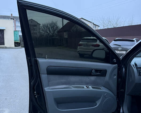 Черный Шевроле Лачетти, объемом двигателя 1.6 л и пробегом 233 тыс. км за 3750 $, фото 25 на Automoto.ua