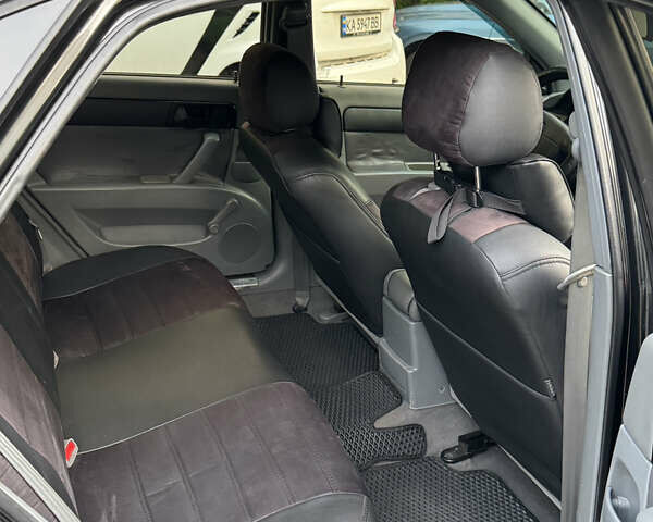 Черный Шевроле Лачетти, объемом двигателя 1.6 л и пробегом 252 тыс. км за 5700 $, фото 7 на Automoto.ua