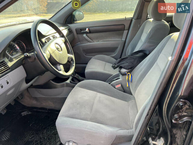 Чорний Шевроле Лачетті, об'ємом двигуна 1.8 л та пробігом 240 тис. км за 3500 $, фото 11 на Automoto.ua