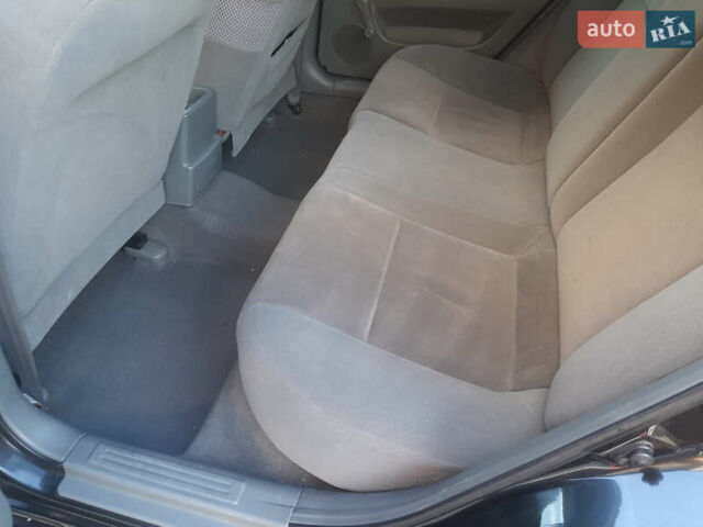 Черный Шевроле Лачетти, объемом двигателя 1.6 л и пробегом 215 тыс. км за 4000 $, фото 7 на Automoto.ua