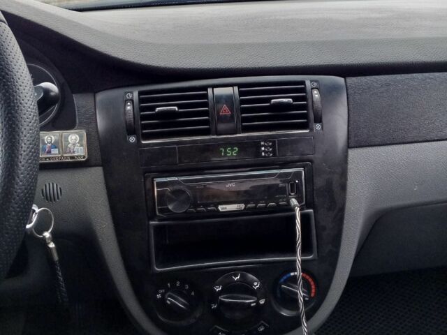 Черный Шевроле Лачетти, объемом двигателя 1.6 л и пробегом 233 тыс. км за 3650 $, фото 4 на Automoto.ua