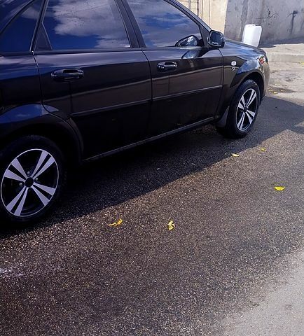 Черный Шевроле Лачетти, объемом двигателя 1.8 л и пробегом 188 тыс. км за 4900 $, фото 1 на Automoto.ua