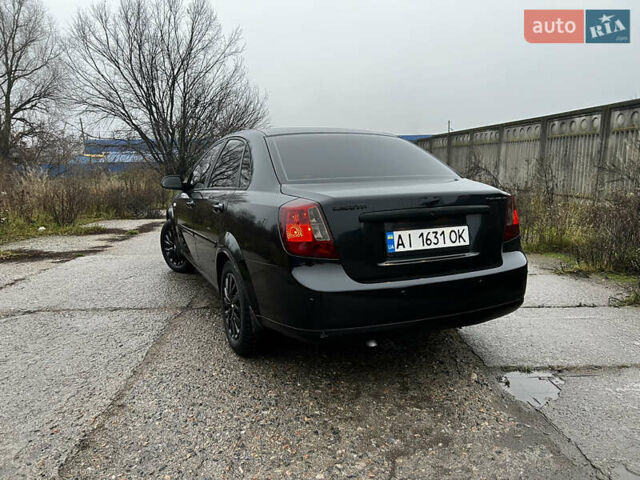 Черный Шевроле Лачетти, объемом двигателя 1.8 л и пробегом 243 тыс. км за 4489 $, фото 3 на Automoto.ua