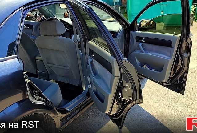 Черный Шевроле Лачетти, объемом двигателя 1.8 л и пробегом 345 тыс. км за 2200 $, фото 4 на Automoto.ua