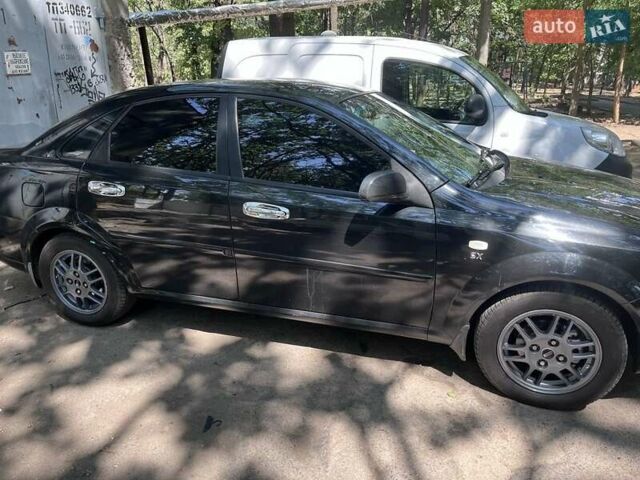 Черный Шевроле Лачетти, объемом двигателя 1.8 л и пробегом 243 тыс. км за 4900 $, фото 4 на Automoto.ua
