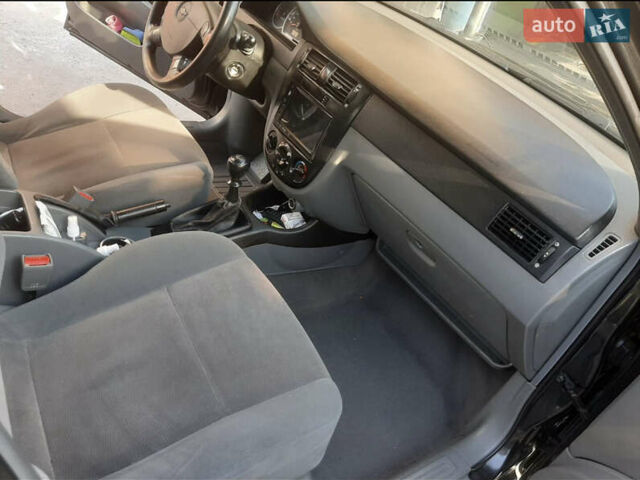 Черный Шевроле Лачетти, объемом двигателя 1.6 л и пробегом 215 тыс. км за 4000 $, фото 9 на Automoto.ua