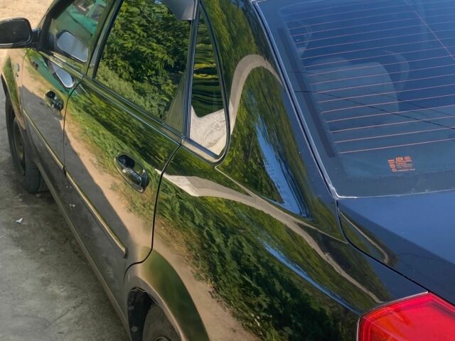 Черный Шевроле Лачетти, объемом двигателя 1.8 л и пробегом 270 тыс. км за 3500 $, фото 1 на Automoto.ua