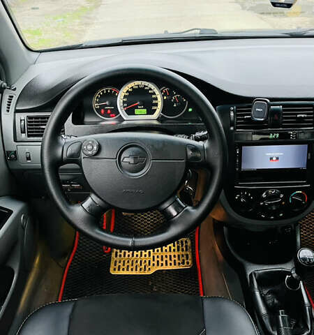 Черный Шевроле Лачетти, объемом двигателя 1.6 л и пробегом 218 тыс. км за 4800 $, фото 26 на Automoto.ua