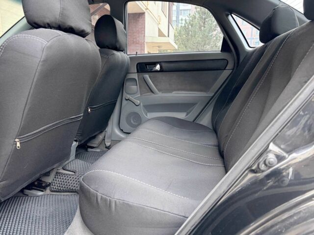 Черный Шевроле Лачетти, объемом двигателя 1.8 л и пробегом 204 тыс. км за 4300 $, фото 13 на Automoto.ua