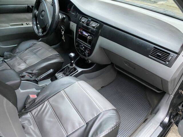 Черный Шевроле Лачетти, объемом двигателя 1.6 л и пробегом 264 тыс. км за 1999 $, фото 4 на Automoto.ua