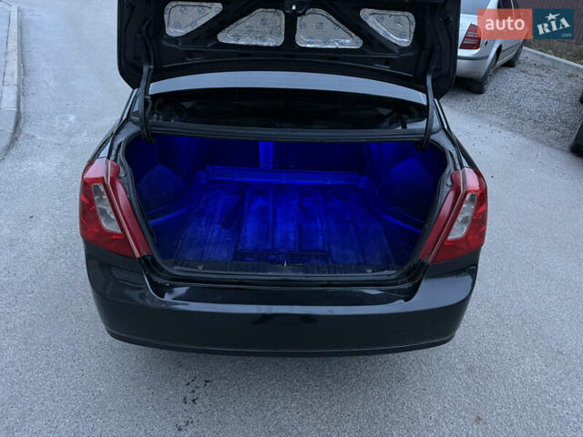 Черный Шевроле Лачетти, объемом двигателя 1.6 л и пробегом 233 тыс. км за 3750 $, фото 11 на Automoto.ua