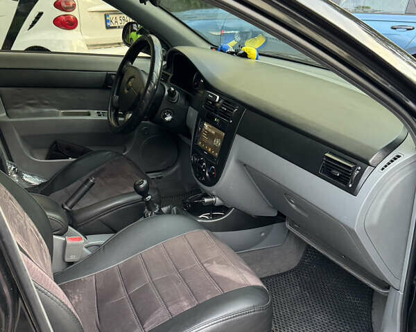 Черный Шевроле Лачетти, объемом двигателя 1.6 л и пробегом 252 тыс. км за 5700 $, фото 8 на Automoto.ua