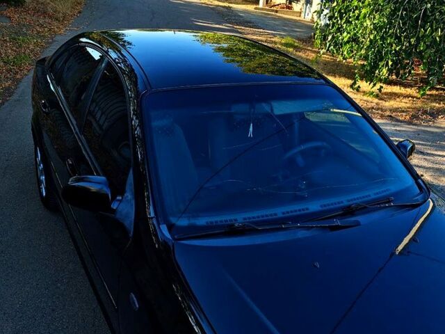 Черный Шевроле Лачетти, объемом двигателя 1.8 л и пробегом 281 тыс. км за 4200 $, фото 2 на Automoto.ua