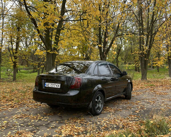 Черный Шевроле Лачетти, объемом двигателя 1.6 л и пробегом 240 тыс. км за 4300 $, фото 4 на Automoto.ua