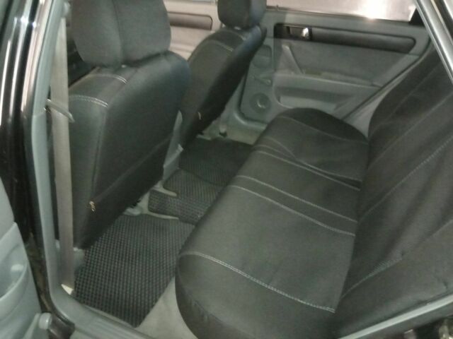 Черный Шевроле Лачетти, объемом двигателя 1.8 л и пробегом 204 тыс. км за 4450 $, фото 11 на Automoto.ua