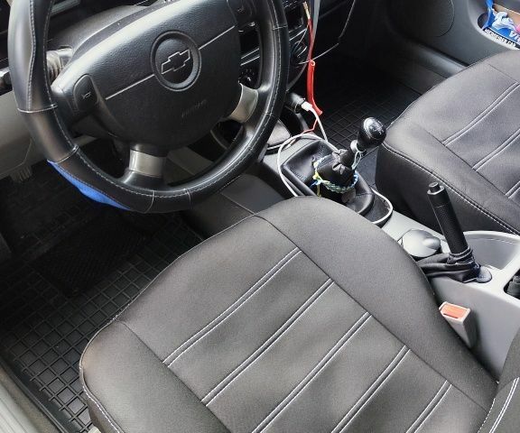 Черный Шевроле Лачетти, объемом двигателя 1.6 л и пробегом 226 тыс. км за 4815 $, фото 17 на Automoto.ua