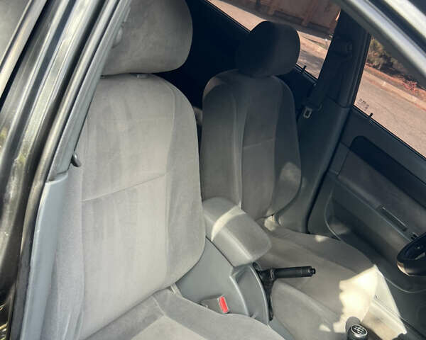 Черный Шевроле Лачетти, объемом двигателя 1.8 л и пробегом 248 тыс. км за 4250 $, фото 19 на Automoto.ua