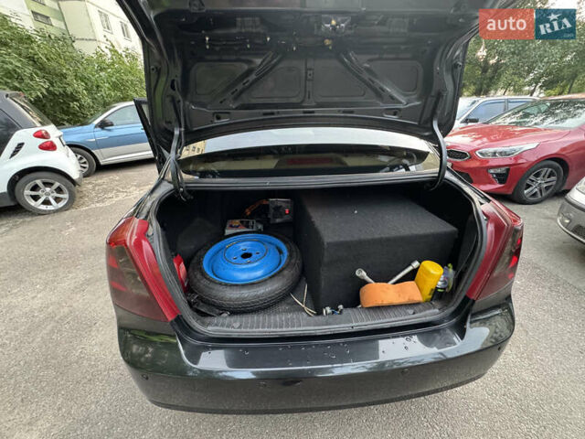 Черный Шевроле Лачетти, объемом двигателя 1.6 л и пробегом 252 тыс. км за 5700 $, фото 25 на Automoto.ua