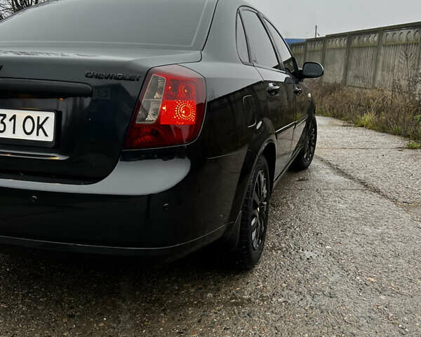 Черный Шевроле Лачетти, объемом двигателя 1.8 л и пробегом 243 тыс. км за 4489 $, фото 6 на Automoto.ua