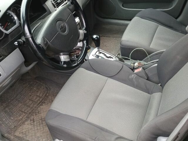 Черный Шевроле Лачетти, объемом двигателя 1.8 л и пробегом 200 тыс. км за 2100 $, фото 4 на Automoto.ua