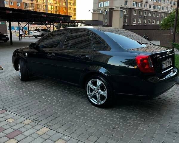 Черный Шевроле Лачетти, объемом двигателя 1.8 л и пробегом 131 тыс. км за 6400 $, фото 15 на Automoto.ua