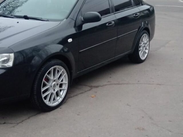 Черный Шевроле Лачетти, объемом двигателя 1.6 л и пробегом 138 тыс. км за 5500 $, фото 1 на Automoto.ua