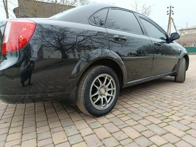 Черный Шевроле Лачетти, объемом двигателя 1.8 л и пробегом 197 тыс. км за 4350 $, фото 5 на Automoto.ua