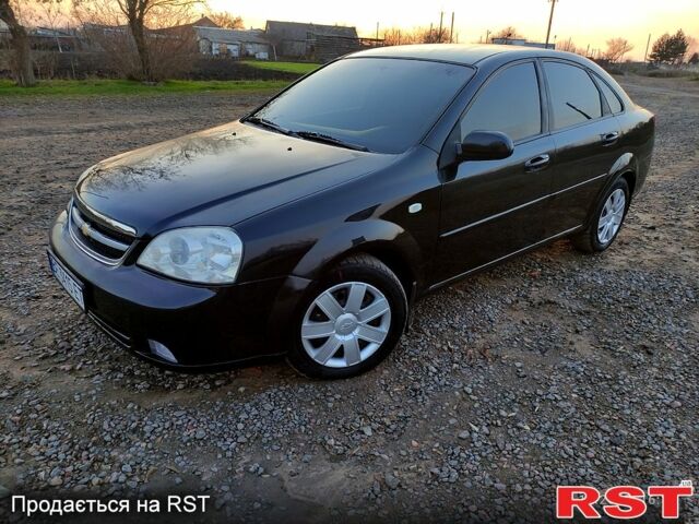 Черный Шевроле Лачетти, объемом двигателя 1.8 л и пробегом 244 тыс. км за 4200 $, фото 12 на Automoto.ua