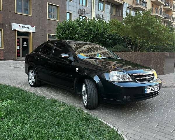 Черный Шевроле Лачетти, объемом двигателя 1.8 л и пробегом 131 тыс. км за 6400 $, фото 26 на Automoto.ua