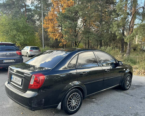 Черный Шевроле Лачетти, объемом двигателя 1.8 л и пробегом 251 тыс. км за 3900 $, фото 5 на Automoto.ua