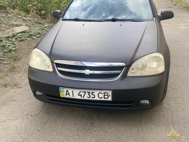 Черный Шевроле Лачетти, объемом двигателя 1.6 л и пробегом 302 тыс. км за 3750 $, фото 5 на Automoto.ua