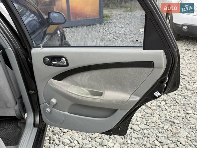 Черный Шевроле Лачетти, объемом двигателя 1.8 л и пробегом 202 тыс. км за 3999 $, фото 31 на Automoto.ua