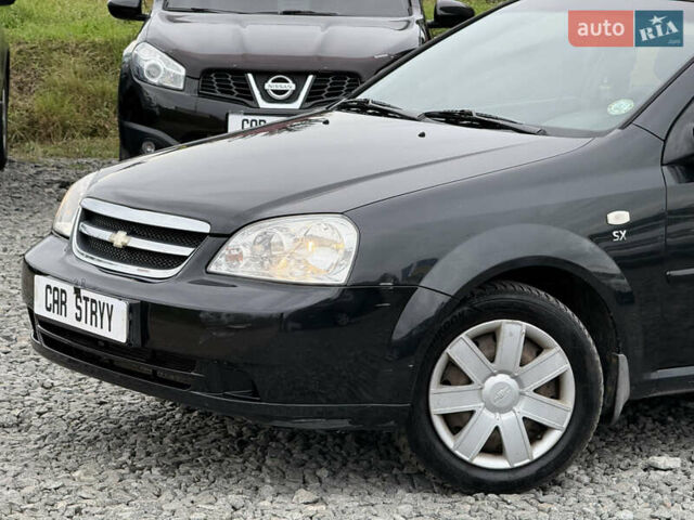 Черный Шевроле Лачетти, объемом двигателя 1.8 л и пробегом 202 тыс. км за 3999 $, фото 10 на Automoto.ua