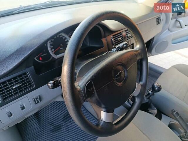Черный Шевроле Лачетти, объемом двигателя 1.6 л и пробегом 99 тыс. км за 5500 $, фото 11 на Automoto.ua
