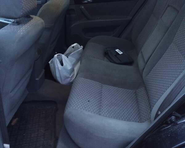 Чорний Шевроле Лачетті, об'ємом двигуна 1.8 л та пробігом 300 тис. км за 3200 $, фото 17 на Automoto.ua