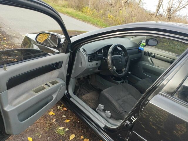 Черный Шевроле Лачетти, объемом двигателя 1.6 л и пробегом 190 тыс. км за 3700 $, фото 5 на Automoto.ua