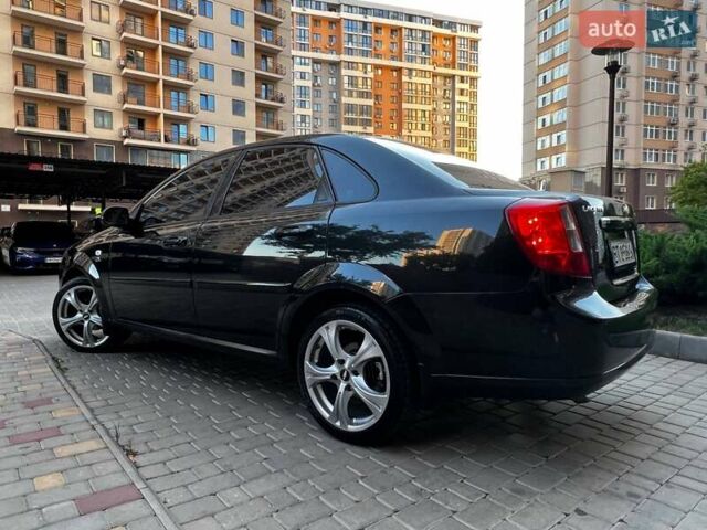 Черный Шевроле Лачетти, объемом двигателя 1.8 л и пробегом 131 тыс. км за 6400 $, фото 36 на Automoto.ua