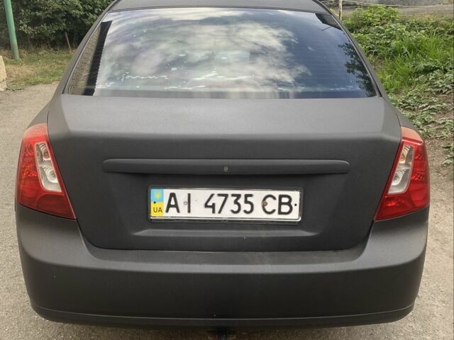 Черный Шевроле Лачетти, объемом двигателя 1.6 л и пробегом 302 тыс. км за 3750 $, фото 6 на Automoto.ua