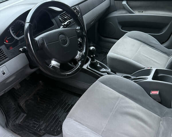 Черный Шевроле Лачетти, объемом двигателя 1.6 л и пробегом 285 тыс. км за 2999 $, фото 5 на Automoto.ua