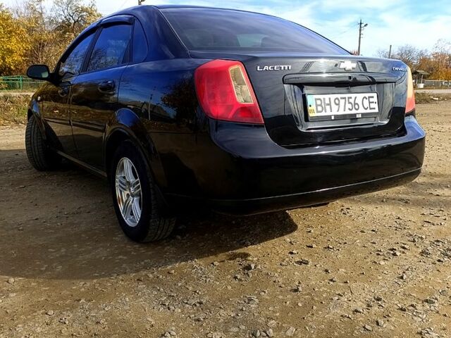 Черный Шевроле Лачетти, объемом двигателя 1.6 л и пробегом 200 тыс. км за 5300 $, фото 3 на Automoto.ua