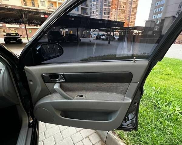 Черный Шевроле Лачетти, объемом двигателя 1.8 л и пробегом 131 тыс. км за 6400 $, фото 48 на Automoto.ua