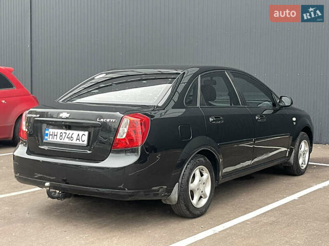 Черный Шевроле Лачетти, объемом двигателя 1.8 л и пробегом 170 тыс. км за 4400 $, фото 5 на Automoto.ua