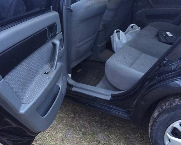 Чорний Шевроле Лачетті, об'ємом двигуна 1.8 л та пробігом 300 тис. км за 3200 $, фото 16 на Automoto.ua