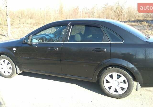 Чорний Шевроле Лачетті, об'ємом двигуна 1.8 л та пробігом 208 тис. км за 5000 $, фото 3 на Automoto.ua