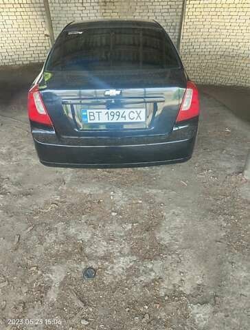 Черный Шевроле Лачетти, объемом двигателя 1.6 л и пробегом 230 тыс. км за 3900 $, фото 9 на Automoto.ua