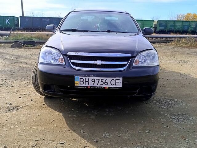 Черный Шевроле Лачетти, объемом двигателя 1.6 л и пробегом 200 тыс. км за 5300 $, фото 4 на Automoto.ua