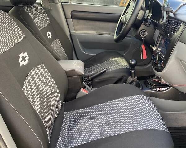 Черный Шевроле Лачетти, объемом двигателя 1.6 л и пробегом 302 тыс. км за 3900 $, фото 1 на Automoto.ua