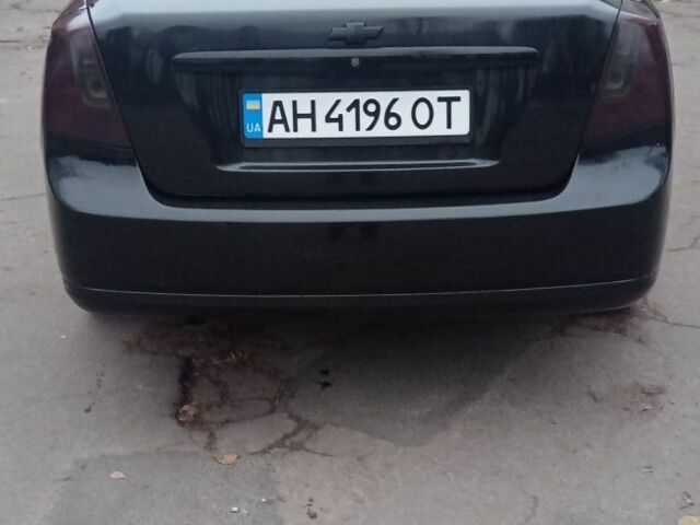Черный Шевроле Лачетти, объемом двигателя 1.6 л и пробегом 138 тыс. км за 5500 $, фото 3 на Automoto.ua