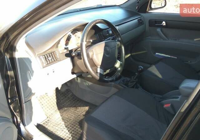 Чорний Шевроле Лачетті, об'ємом двигуна 1.8 л та пробігом 208 тис. км за 5000 $, фото 4 на Automoto.ua