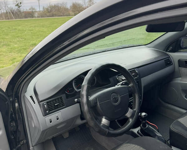 Черный Шевроле Лачетти, объемом двигателя 1.6 л и пробегом 153 тыс. км за 5000 $, фото 6 на Automoto.ua